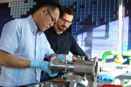 Men working pump machine