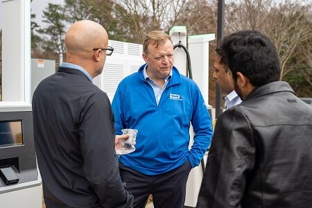 Men talking outside a break area